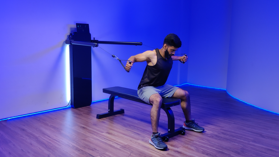 A woman performs a Seated Cable Chest Fly exercise, targeting chest and shoulder muscles.