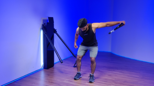 Man performing Bent Over Single Arm D Handle Rear Delt Flies exercise at the gym