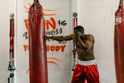 Person engaging in weight training exercise for fat loss