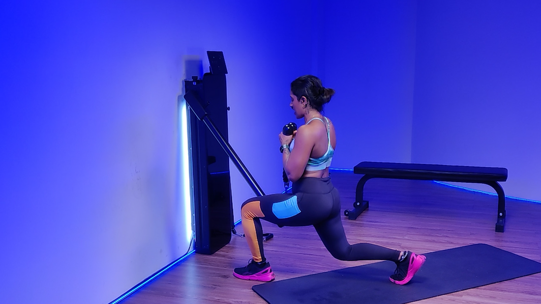 A man performing pulsing lunges with resistance bands, targeting lower body muscles.